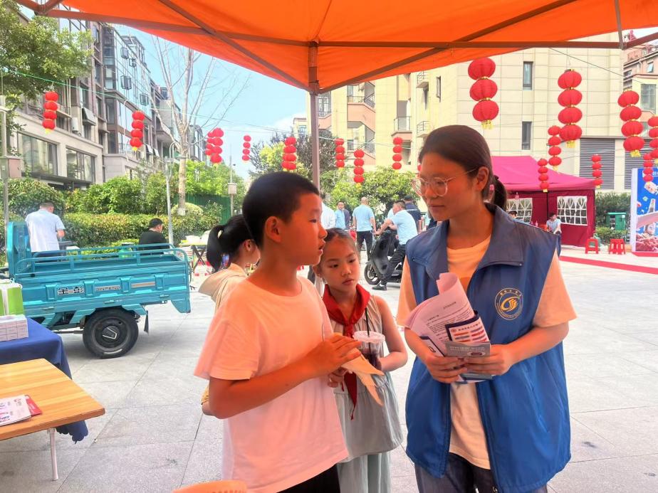 信息学院志愿者团队深入社区开展反诈科普活动